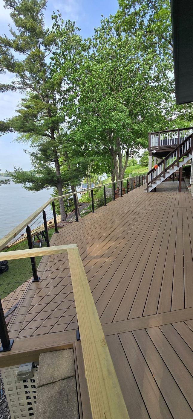 Multi-level composite deck with stairs and cable railing